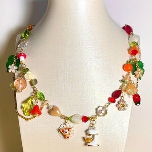 Red and Green Beaded Necklace with Charms